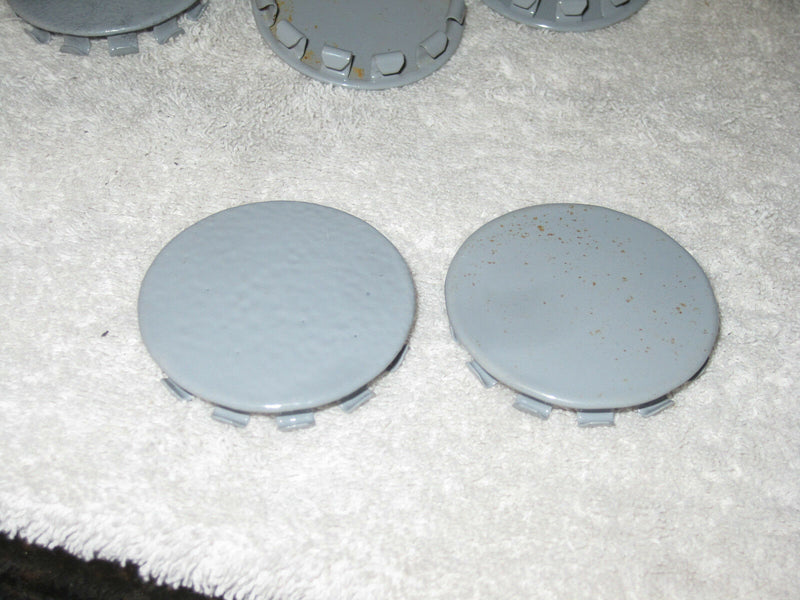 (Lot Of 24) Gray Knock Out Plugs